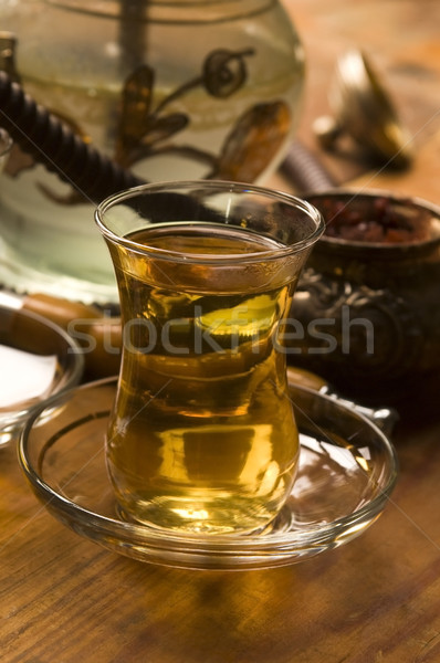 Cup of turkish tea and hookah served in traditional style Stock photo © joannawnuk