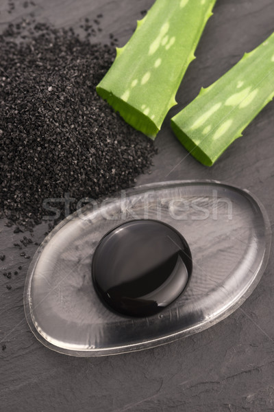 black charcoal mask with aloe vera Stock photo © joannawnuk