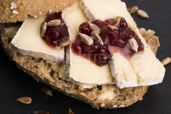 bread served with camembert and cranberry Stock photo © joannawnuk