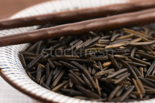 wild rice in a white ceramic bowl Stock photo © joannawnuk