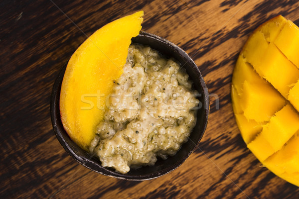 Tapioca pudding with slices of mango Stock photo © joannawnuk
