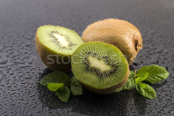 Suculento kiwi fruto de folhas fundo Foto stock © joannawnuk