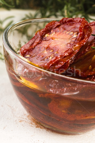 Sun dried tomatoes with olive oil Stock photo © joannawnuk