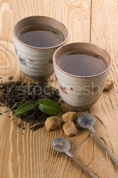 Groene thee vers tak blad thee goud Stockfoto © joannawnuk