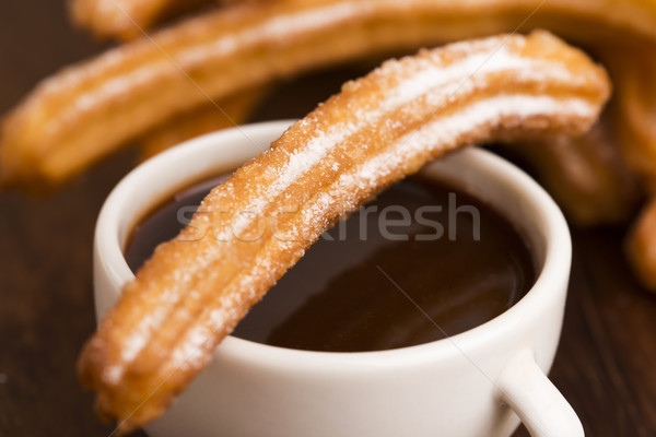 deliciuos spanish Churros with hot chocolate Stock photo © joannawnuk