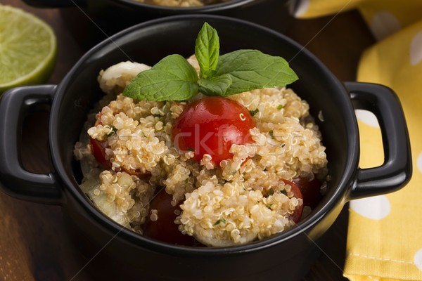 Tabbouleh Quinoa with tomatoes, onion, mint, parsley and lemon Stock photo © joannawnuk