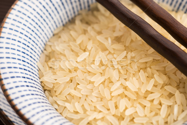 bowl of parboiled risotto rice Stock photo © joannawnuk