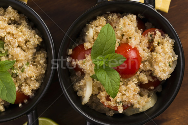 Tabbouleh Quinoa with tomatoes, onion, mint, parsley and lemon Stock photo © joannawnuk