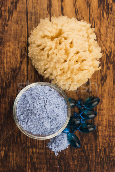 Blue clay mask with serum capsules Stock photo © joannawnuk