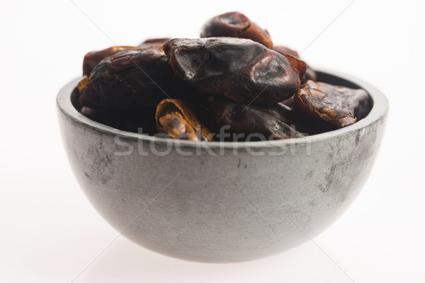 Dried dates fruit in a bowl Stock photo © joannawnuk