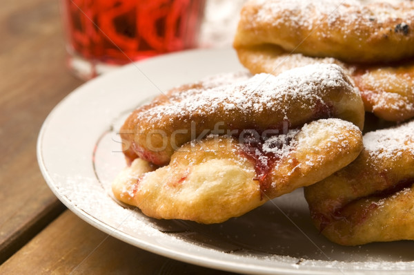 Sweet doughnuts with rose marmelade Stock photo © joannawnuk