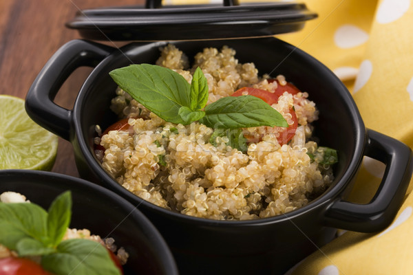 Tabbouleh Quinoa with tomatoes, onion, mint, parsley and lemon Stock photo © joannawnuk