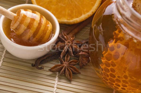 fresh honey with honeycomb, spices and fruits Stock photo © joannawnuk