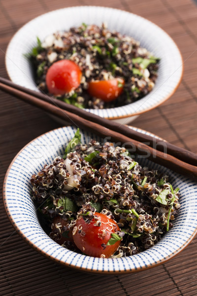 Tabbouleh Quinoa with tomatoes, onion, mint, parsley and lemon Stock photo © joannawnuk