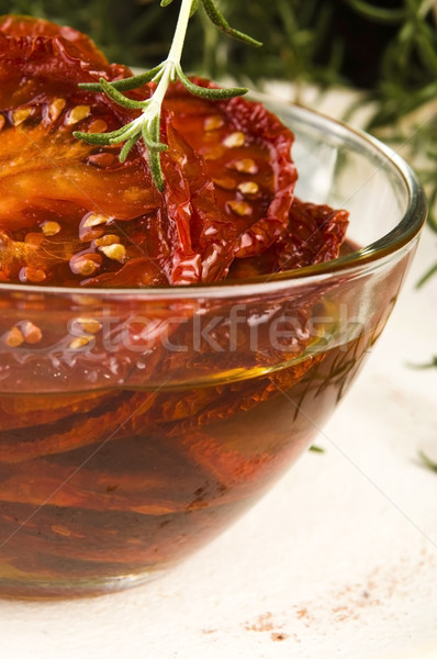 Sun dried tomatoes with olive oil Stock photo © joannawnuk
