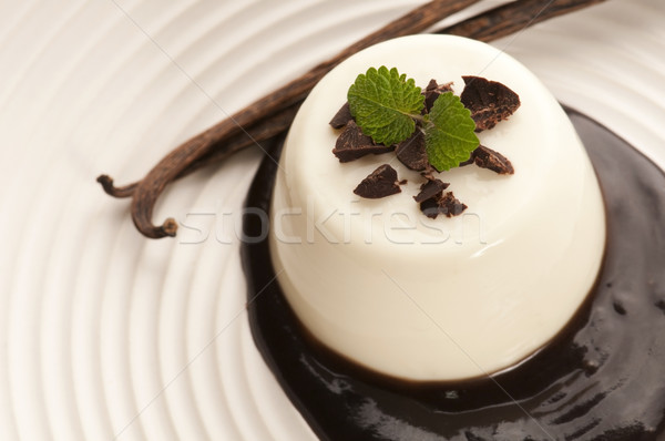 Panna Cotta with chocolate and vanilla beans Stock photo © joannawnuk