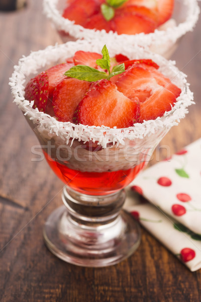 A serving of strawberry over tapioca and jelly Stock photo © joannawnuk