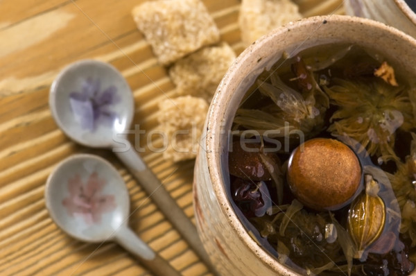 Thee blad vruchten goud beker asian Stockfoto © joannawnuk
