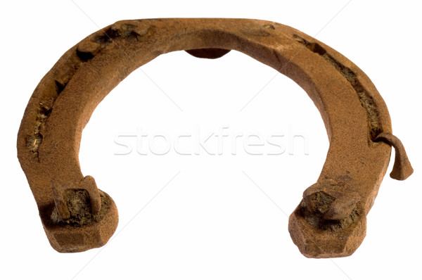 rusty old horseshoe on white background Stock photo © joannawnuk
