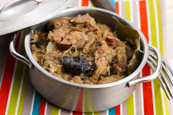 traditional polish sauerkraut (bigos) with mushrooms and plums Stock photo © joannawnuk