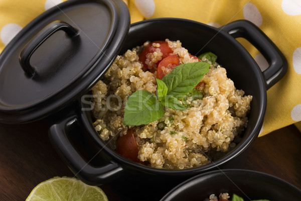 Tabbouleh Quinoa with tomatoes, onion, mint, parsley and lemon Stock photo © joannawnuk