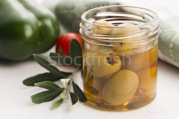 pickled olives and olive tree branch Stock photo © joannawnuk