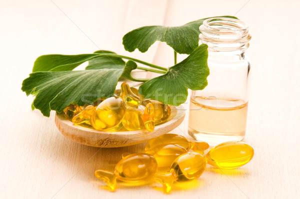 ginko biloba essential oil with fresh leaves - beauty treatment Stock photo © joannawnuk
