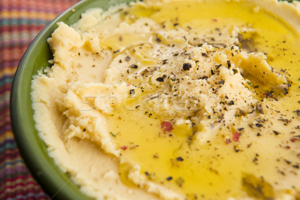 A bowl of creamy hummus Stock photo © joannawnuk