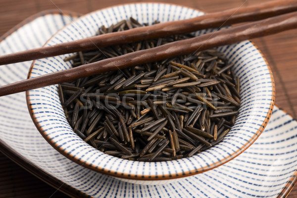 wild rice in a white ceramic bowl Stock photo © joannawnuk