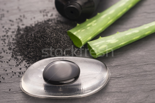 Stock photo: black charcoal mask with aloe vera