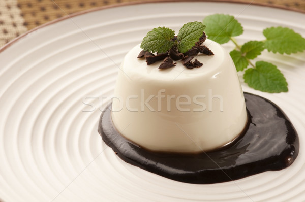 Panna Cotta with chocolate and vanilla beans Stock photo © joannawnuk