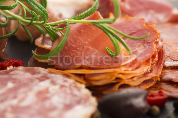 a pile of different spanish embutido, jamon, chorizo and lomo em Stock photo © joannawnuk