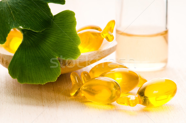 ginko biloba essential oil with fresh leaves - beauty treatment  Stock photo © joannawnuk