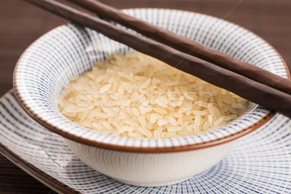 bowl of parboiled risotto rice Stock photo © joannawnuk