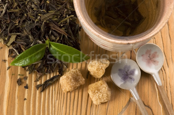 Groene thee vers tak blad thee goud Stockfoto © joannawnuk