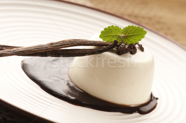 Panna Cotta with chocolate and vanilla beans Stock photo © joannawnuk