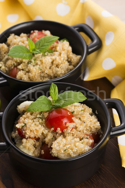 Tabbouleh Quinoa with tomatoes, onion, mint, parsley and lemon Stock photo © joannawnuk