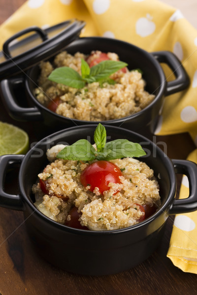 Tabbouleh Quinoa with tomatoes, onion, mint, parsley and lemon Stock photo © joannawnuk