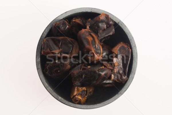 Dried dates fruit in a bowl Stock photo © joannawnuk