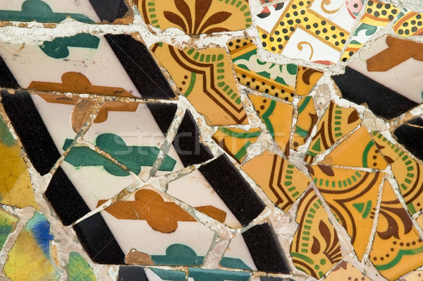Detail of the ceramics from the Guadi bench in park Guell Barcelona, Spain Stock photo © joannawnuk