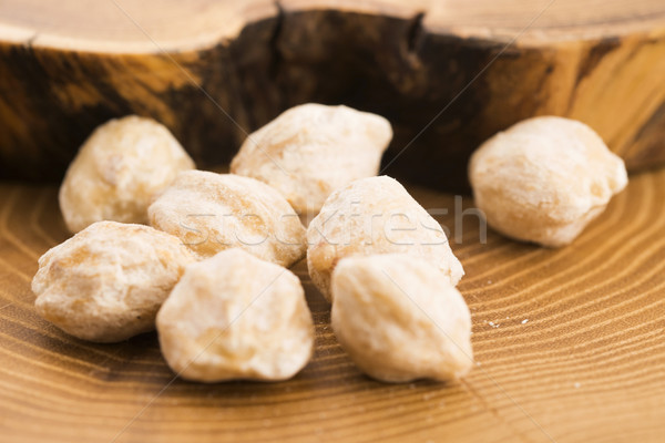 Candlenut or Kukui is a spice especially used in indonesian cook Stock photo © joannawnuk