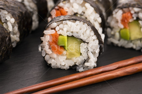 Salmon rolls served on a plate Stock photo © joannawnuk