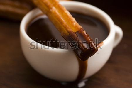 deliciuos spanish Churros with hot chocolate Stock photo © joannawnuk