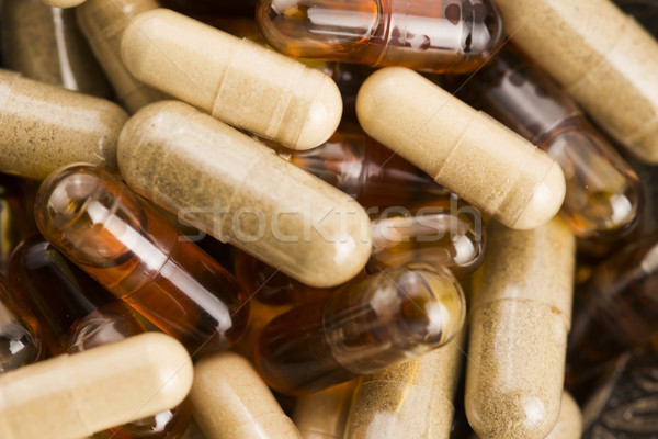 pills with herbs, macro Stock photo © joannawnuk