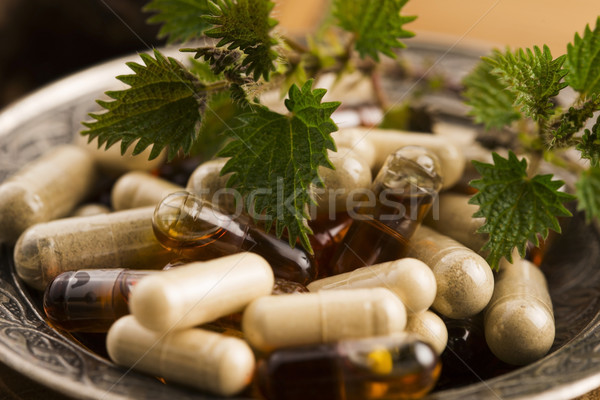 pills with herbs, macro Stock photo © joannawnuk