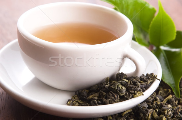 Csésze zöld tea levelek reggeli makró gyógynövény Stock fotó © joannawnuk