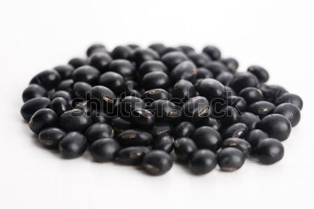 A lot of black soybeans on wooden background Stock photo © joannawnuk