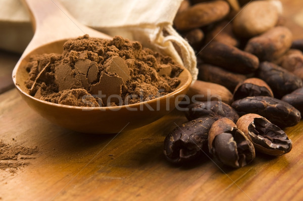 Cacau feijões naturalismo mesa de madeira chocolate cozinha Foto stock © joannawnuk