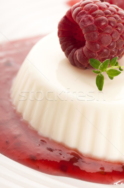 Vanilla panna cotta with berry sauce Stock photo © joannawnuk