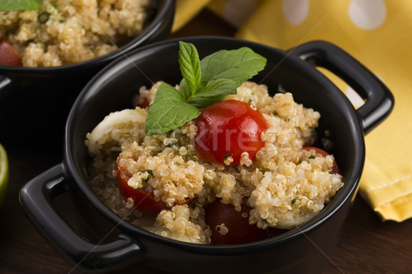 Tabbouleh Quinoa with tomatoes, onion, mint, parsley and lemon Stock photo © joannawnuk